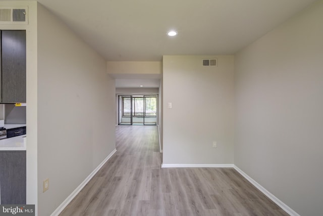 5241 W Running Brook Rd Unit 302, Columbia, MD 21044 - corridor featuring light wood finished floors, baseboards, and recessed lighting