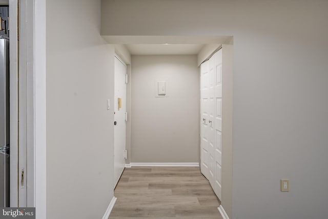 5241 W Running Brook Rd Unit 302, Columbia, MD 21044 - corridor with light wood finished floors and baseboards