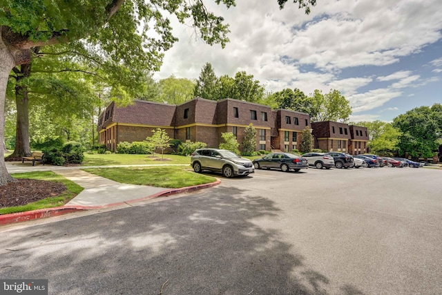5241 W Running Brook Rd Unit 302, Columbia, MD 21044 - view of property featuring uncovered parking