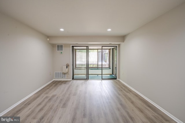 5241 W Running Brook Rd Unit 302, Columbia, MD 21044 - empty room with wood finished floors, baseboards, and recessed lighting