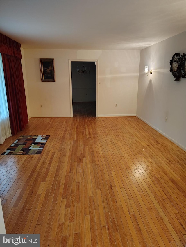 1412 Albert Dr, Bowie, MD 20721 - empty room with light wood-style flooring and baseboards
