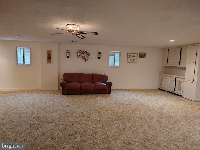 1412 Albert Dr, Bowie, MD 20721 - living area with plenty of natural light, light carpet, and ceiling fan