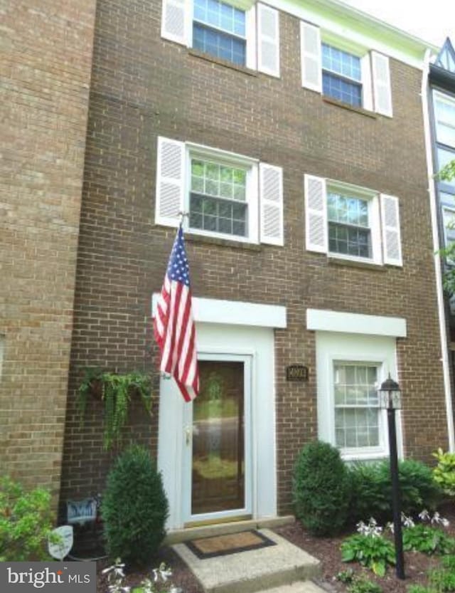 14803 Haymarket Ln, Centreville, VA 20120 - property entrance featuring brick siding