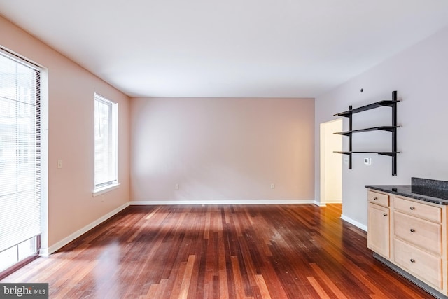 11 W 2nd St Unit 130, Bethlehem, PA 18015 - unfurnished living room with hardwood / wood-style flooring and baseboards
