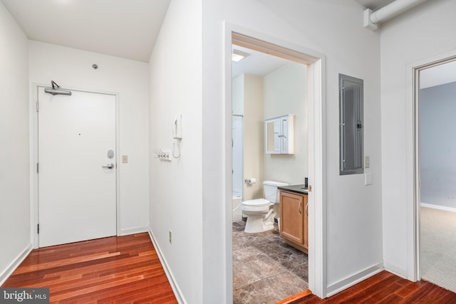 11 W 2nd St Unit 130, Bethlehem, PA 18015 - hall featuring electric panel, wood finished floors, and baseboards