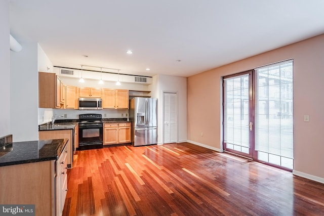11 W 2nd St Unit 130, Bethlehem, PA 18015 - kitchen with appliances with stainless steel finishes, light wood finished floors, baseboards, a sink, and recessed lighting