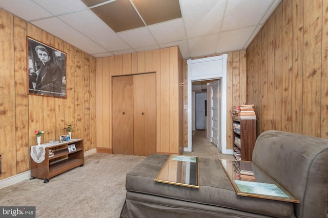 113 N Highland Ave, Baltimore, MD 21224 - carpeted home office featuring a drop ceiling, wood walls, and baseboards