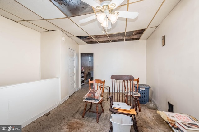 113 N Highland Ave, Baltimore, MD 21224 - sitting room with ceiling fan and carpet floors
