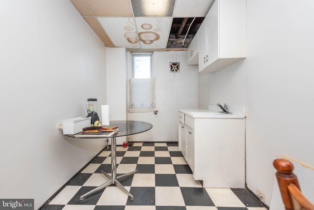 113 N Highland Ave, Baltimore, MD 21224 - bathroom featuring tile patterned floors and vanity