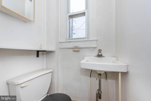 113 N Highland Ave, Baltimore, MD 21224 - half bathroom featuring toilet