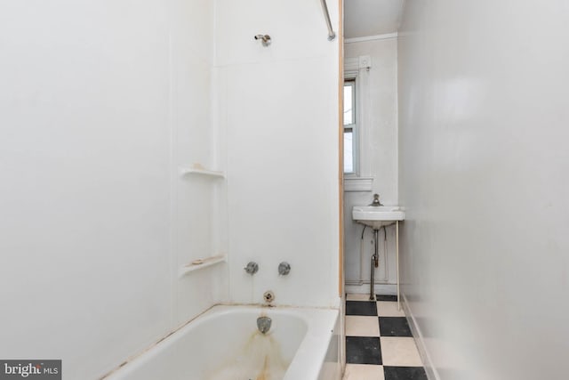 113 N Highland Ave, Baltimore, MD 21224 - full bathroom featuring  shower combination and baseboards
