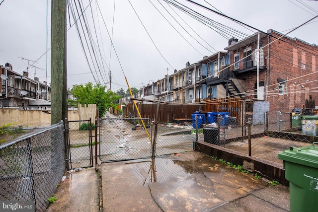 113 N Highland Ave, Baltimore, MD 21224 - view of road with a gate and a residential view