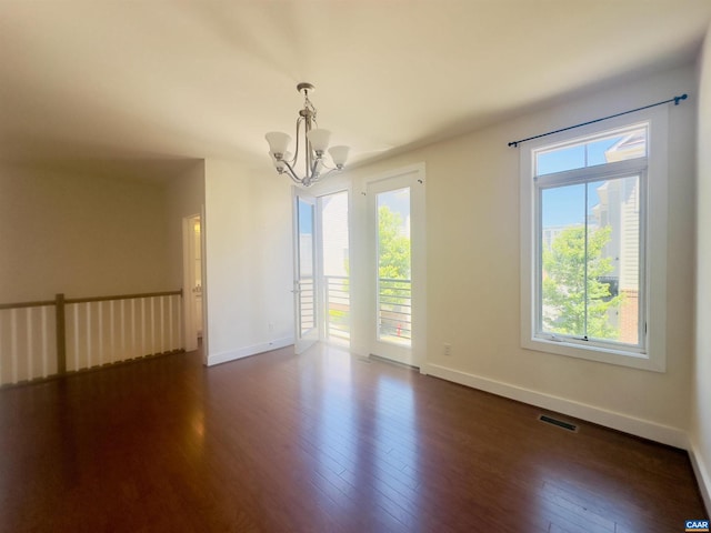 2112 Kober Way, Charlottesville, VA 22901 - empty room with a chandelier, dark wood-type flooring, and baseboards