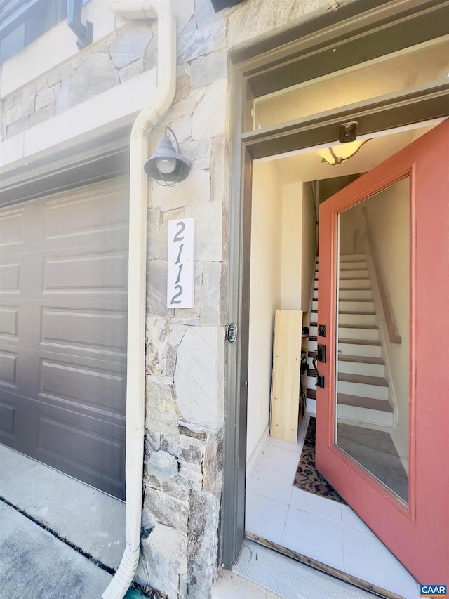 2112 Kober Way, Charlottesville, VA 22901 - property entrance with stone siding and a garage