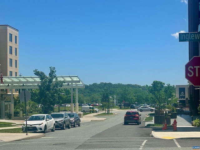 2112 Kober Way, Charlottesville, VA 22901 - view of asphalt road with sidewalks, curbs, and traffic signs