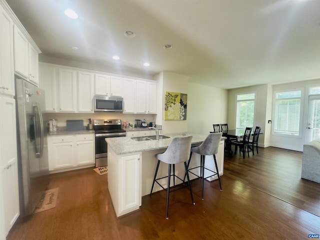 2112 Kober Way, Charlottesville, VA 22901 - kitchen featuring stainless steel appliances, a sink, dark wood-style floors, white cabinetry, and recessed lighting