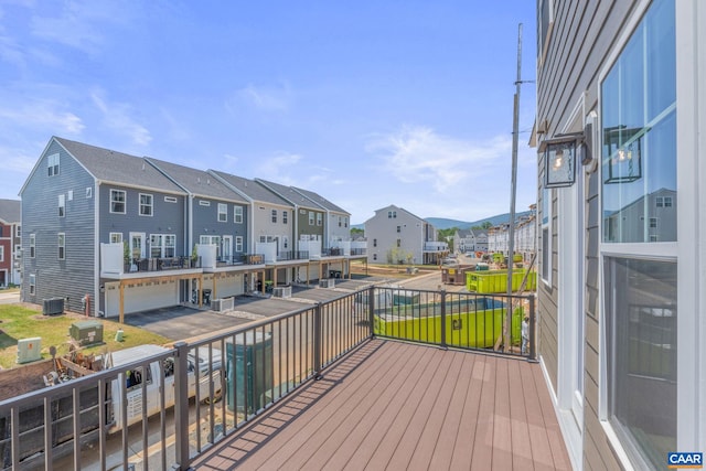 80A Park Ridge Dr, Crozet, VA 22932 - wooden deck with a residential view, central AC unit, and an attached garage