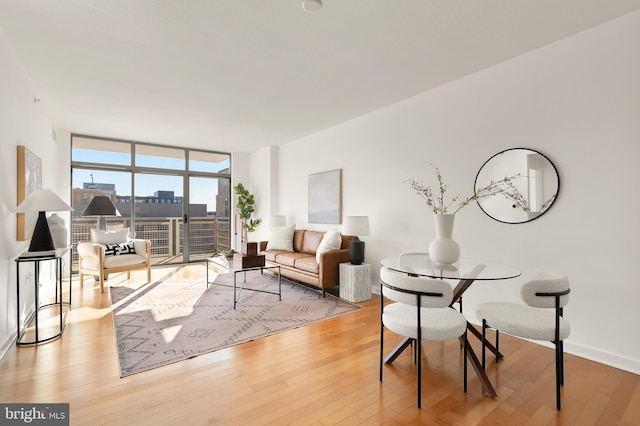 475 K St NW Unit 906, Washington, DC 20001 - living area with floor to ceiling windows and wood finished floors