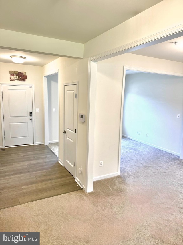 504 S Regulator Dr S, Cambridge, MD 21613 - hallway with baseboards and carpet flooring