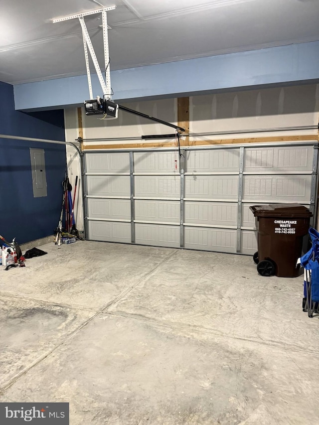 504 S Regulator Dr S, Cambridge, MD 21613 - garage featuring electric panel and a garage door opener