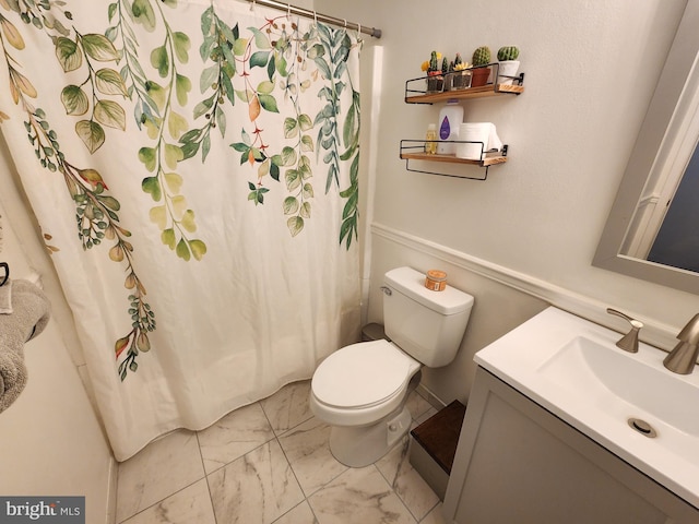 87 Summers St, Inwood, WV 25428 - full bath with marble finish floors, vanity, toilet, and a shower with shower curtain