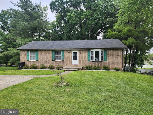 87 Summers St, Inwood, WV 25428 - single story home featuring brick siding and a front lawn