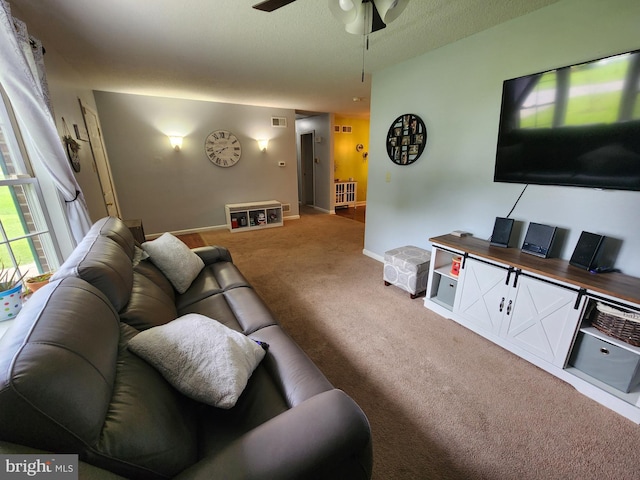87 Summers St, Inwood, WV 25428 - carpeted living room featuring a ceiling fan and baseboards