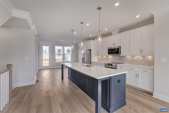 750 Park Ridge Dr, Crozet, VA 22932 - kitchen featuring appliances with stainless steel finishes, a sink, white cabinetry, baseboards, and a large island