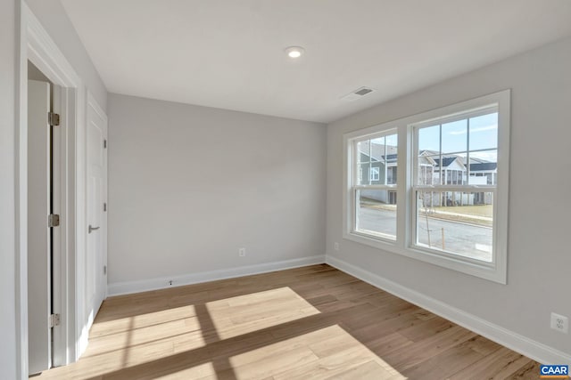 750 Park Ridge Dr, Crozet, VA 22932 - spare room featuring baseboards, light wood-style floors, and recessed lighting