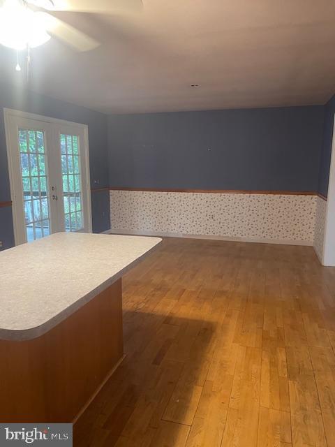 8 Love Creek Dr, Lewes, DE 19958 - interior space featuring light wood-type flooring, ceiling fan, and french doors