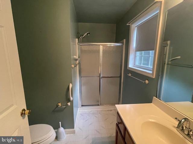 8 Love Creek Dr, Lewes, DE 19958 - full bath with a shower stall, vanity, toilet, marble look tile flooring, and baseboards