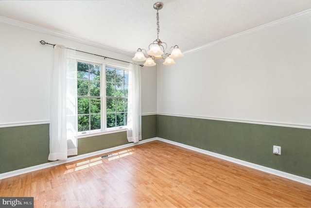 351 Point To Point Rd, Bel Air, MD 21015 - empty room with a chandelier, baseboards, wood finished floors, and ornamental molding