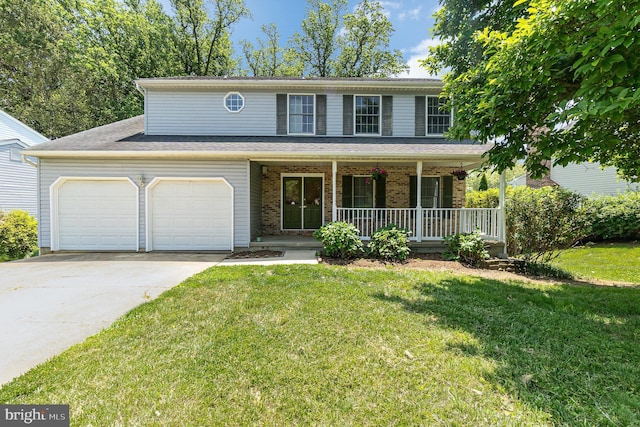 351 Point To Point Rd, Bel Air, MD 21015 - view of front of property with a porch, a front lawn, concrete driveway, a garage, and brick siding