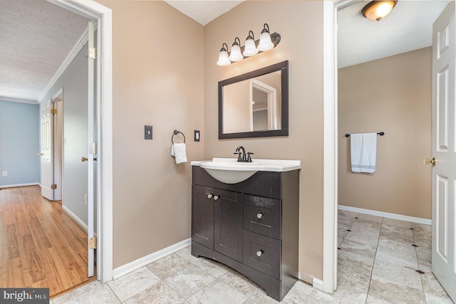 351 Point To Point Rd, Bel Air, MD 21015 - bathroom with vanity, ornamental molding, and baseboards