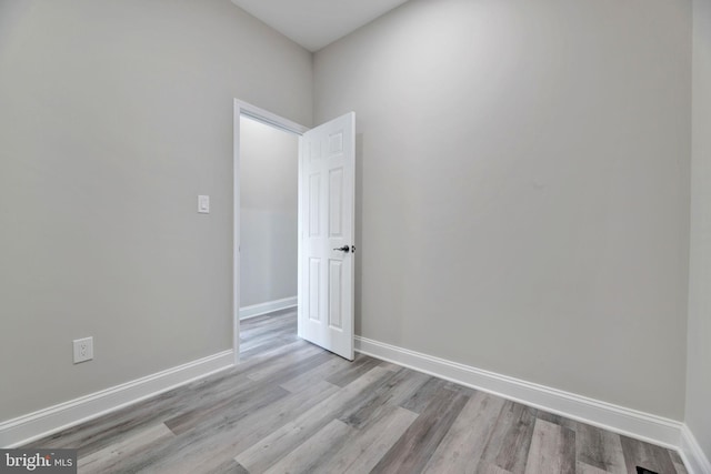 1121 48th Pl NE, Washington, DC 20019 - unfurnished room with wood finished floors and baseboards