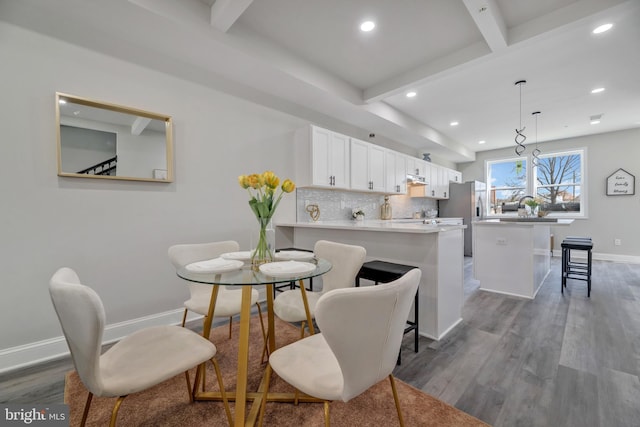 1121 48th Pl NE, Washington, DC 20019 - dining space featuring wood finished floors, recessed lighting, baseboards, and beam ceiling