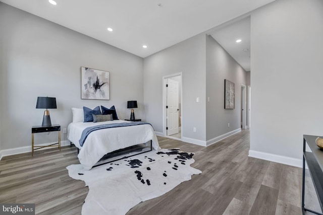 1121 48th Pl NE, Washington, DC 20019 - bedroom with wood finished floors, baseboards, and recessed lighting