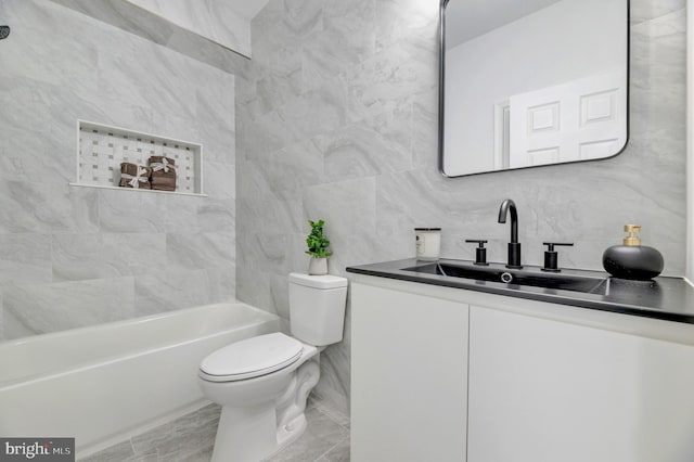 1121 48th Pl NE, Washington, DC 20019 - full bath with tile walls, toilet, vanity, a tub, and decorative backsplash
