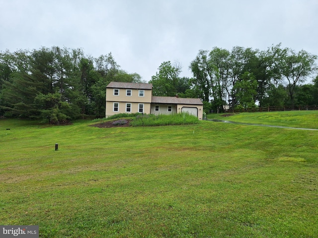 1515 Fox Run Dr, Coatesville, PA 19320 - colonial house featuring an attached garage and a front yard