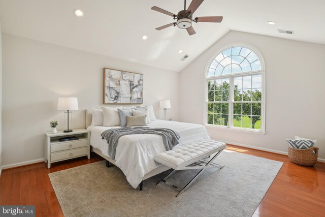 25487 Dabner Dr, Chantilly, VA 20152 - bedroom featuring multiple windows, wood finished floors, lofted ceiling, baseboards, and ceiling fan