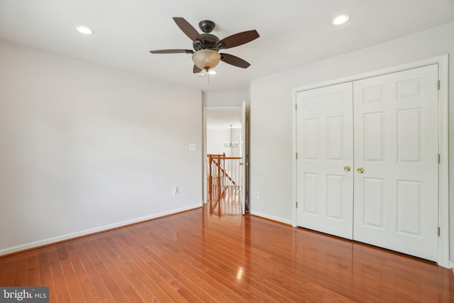 25487 Dabner Dr, Chantilly, VA 20152 - unfurnished bedroom featuring baseboards, wood finished floors, a closet, recessed lighting, and ceiling fan