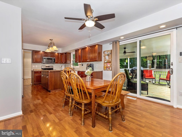4024 Roop Rd, New Windsor, MD 21776 - dining room featuring a ceiling fan, light wood finished floors, baseboards, and recessed lighting