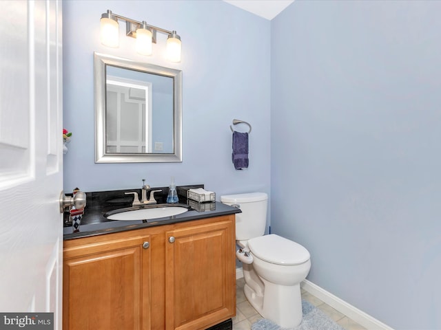 4024 Roop Rd, New Windsor, MD 21776 - half bathroom with toilet, vanity, tile patterned floors, and baseboards