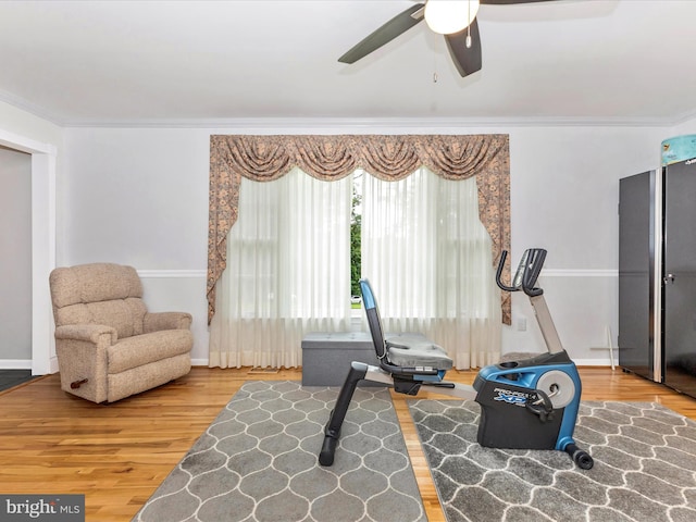 4024 Roop Rd, New Windsor, MD 21776 - living room with wood finished floors, ceiling fan, crown molding, and baseboards