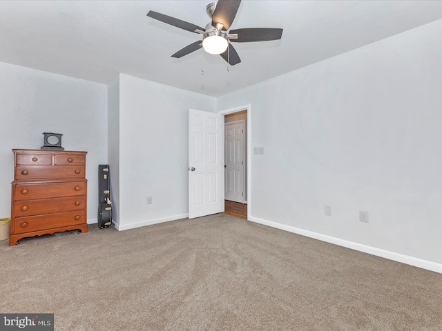 4024 Roop Rd, New Windsor, MD 21776 - unfurnished bedroom with carpet floors, baseboards, and ceiling fan
