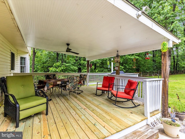 4024 Roop Rd, New Windsor, MD 21776 - wooden deck featuring a ceiling fan and view of wooded area