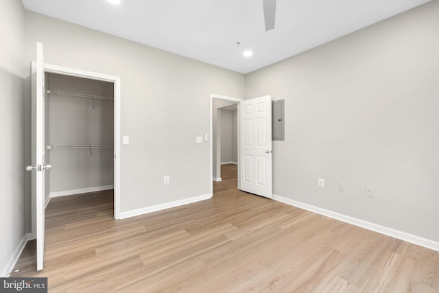 11345 Aristotle Dr Unit 6-311, Fairfax, VA 22030 - unfurnished bedroom with electric panel, light wood finished floors, baseboards, and recessed lighting