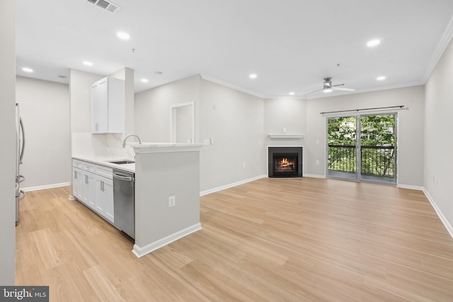 11345 Aristotle Dr Unit 6-311, Fairfax, VA 22030 - kitchen with appliances with stainless steel finishes, a sink, ceiling fan, white cabinetry, and recessed lighting