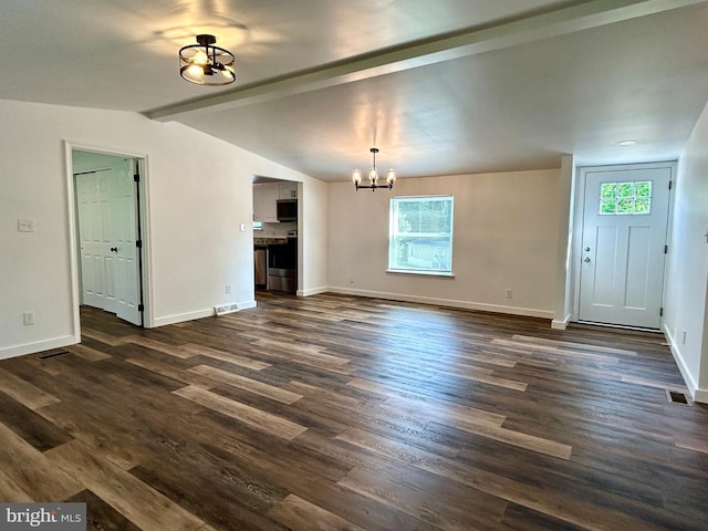 135 Crawford Quarry Rd, Falling Waters, WV 25419 - unfurnished living room featuring a chandelier, dark wood-style floors, and baseboards