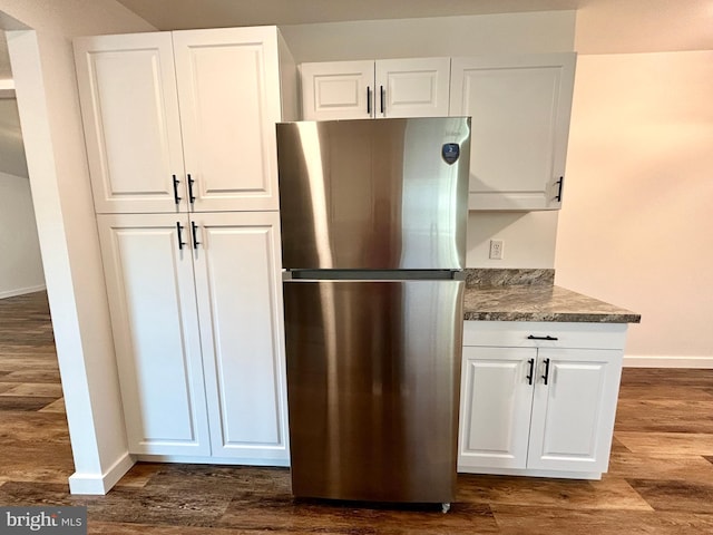 135 Crawford Quarry Rd, Falling Waters, WV 25419 - kitchen featuring freestanding refrigerator, baseboards, and white cabinets